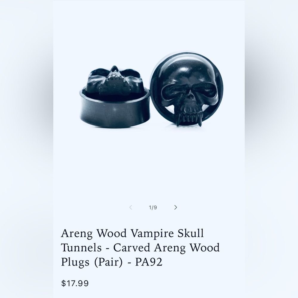 Brand new men’s/women’s black wooden 0 gauge black wooden vampire skull plugs.